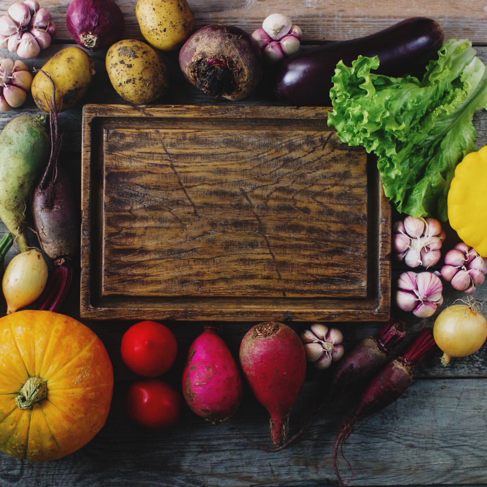 Close-up of fresh local vegetables on a polished table